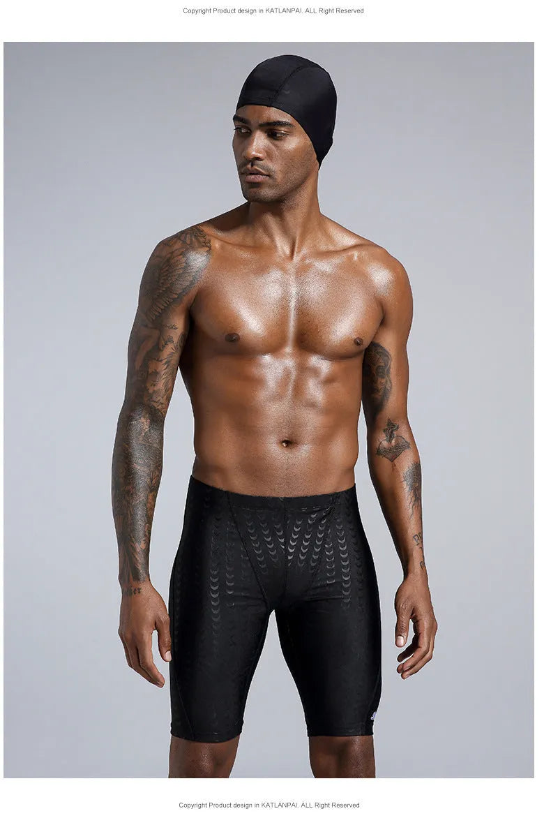 Men's solid colour swimming trunks in waterproof shark skin polyester fabric