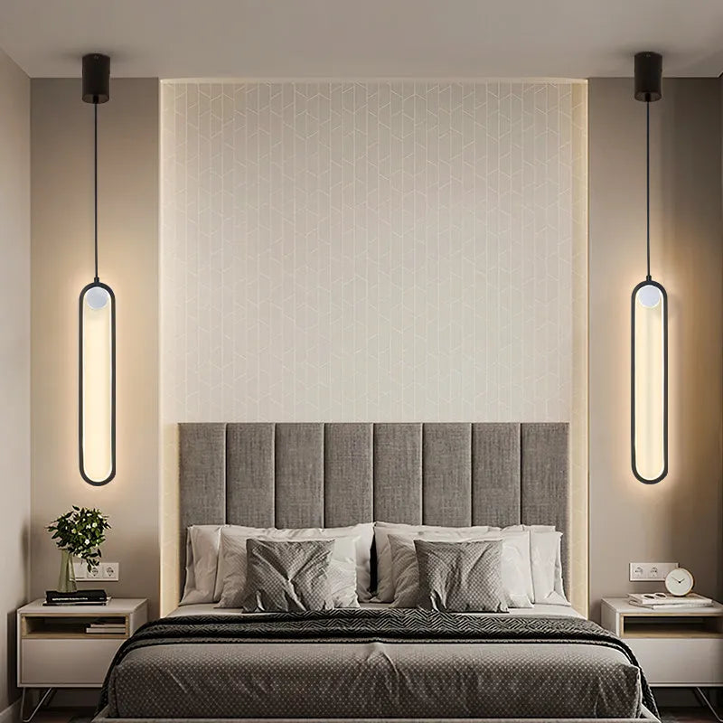 Nordic minimalist oval bedside chandelier in gold finish with integrated LED light source