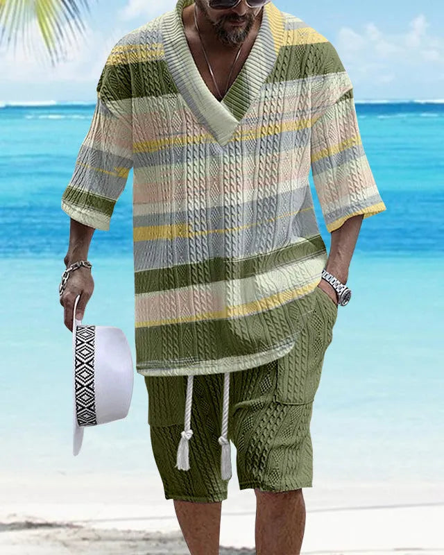 Loose casual short sleeve suit set in a light colour, showing the top and matching shorts laid flat.