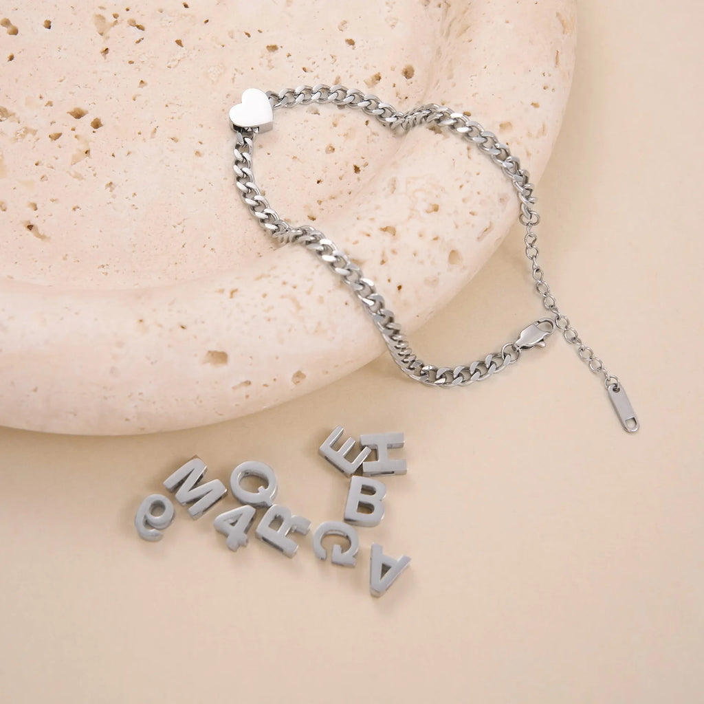 Titanium steel necklace with electroplated gold letter pendant on 40cm chain