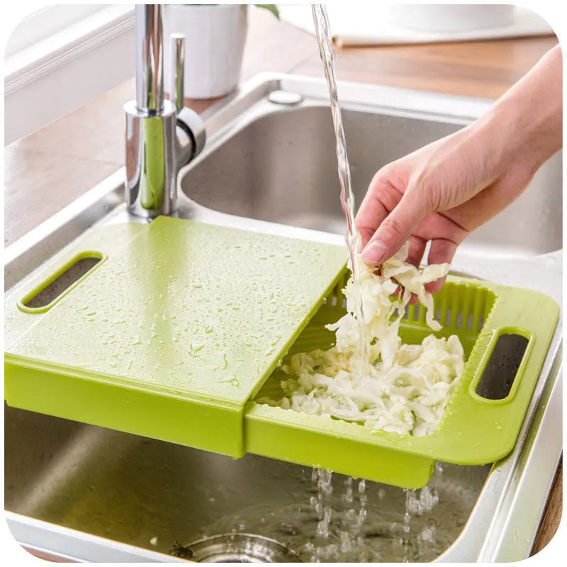 Blue kitchen chopping board with integrated drain basket for vegetable and meat preparation