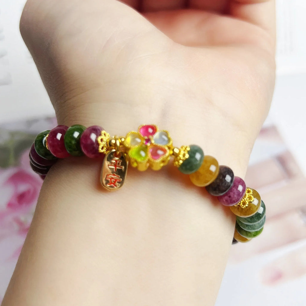 Women's bracelet with colourful tourmaline abacus beads and artificial crystal jade beads in hand-crafted design
