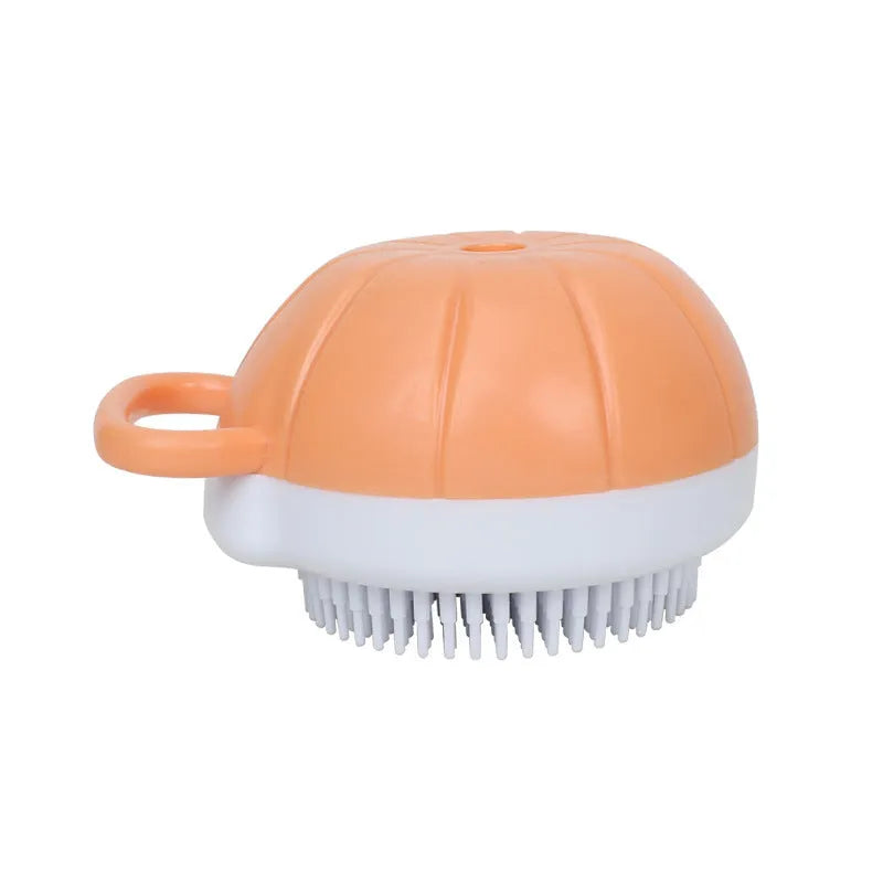 Orange TPR dog bath brush with shampoo dispenser and massage bristles