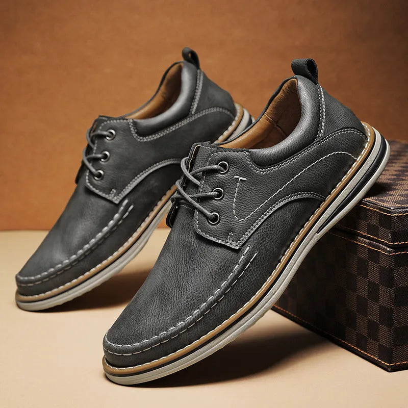 Men's black genuine leather casual shoes with round toe and lace-up front