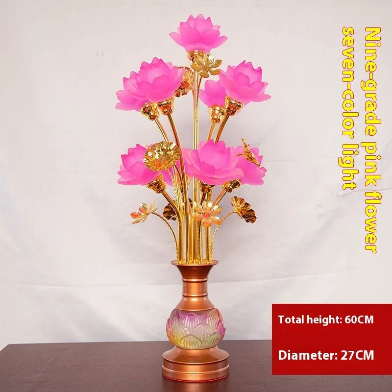 Coloured glaze pink and yellow LED lotus lantern for Buddha worship on an alloy stand.