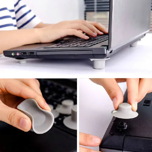 Four grey durable plastic laptop cooling pads, two large and two small, on a wooden desk
