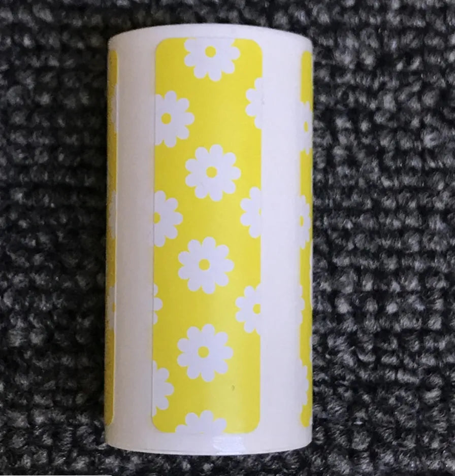 PerPage mini wireless portable thermal printer paper roll in multiple colours, showing label and sticker options