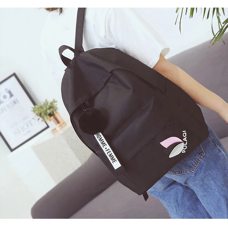 Green canvas college style schoolbag with leaves pattern and anti-theft features