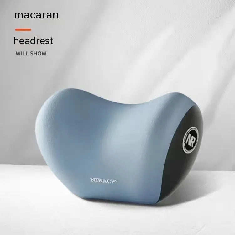 Black memory foam car headrest pillow and matching lumbar support pillow on a car seat.