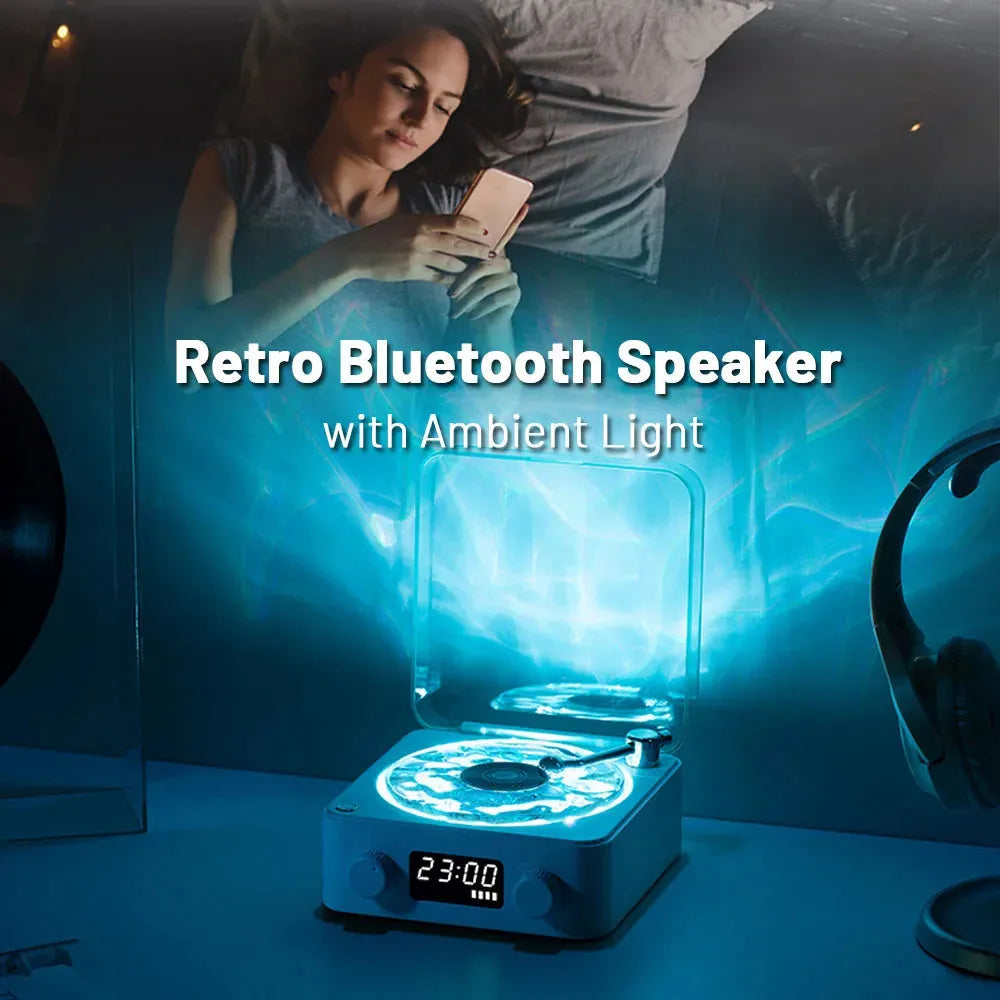 Retro Bluetooth speaker with rotating transparent turntable and RGB projection lighting effects