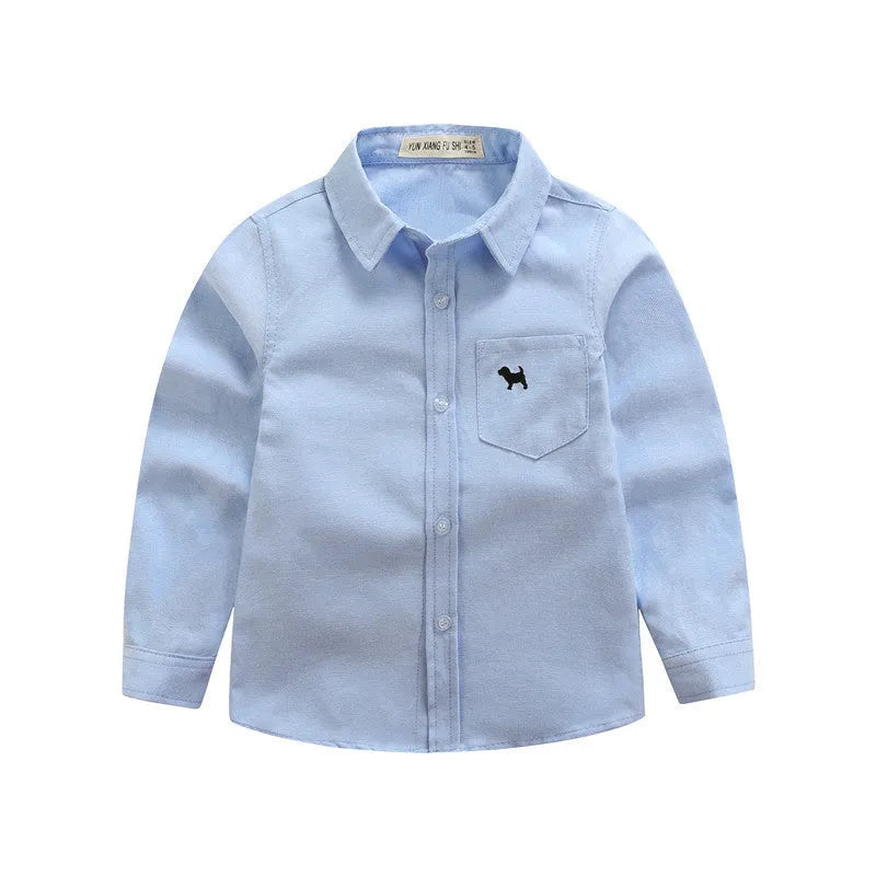 Boy's blue long-sleeved cotton shirt with lapel collar shown on a hanger.