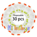 Baby food maker squeeze station pressing homemade fruit puree into 4oz pouch on countertop