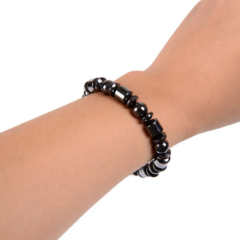 Black stretch magnetic therapy bracelet with pentagram magnetite and hematite stones for women and men