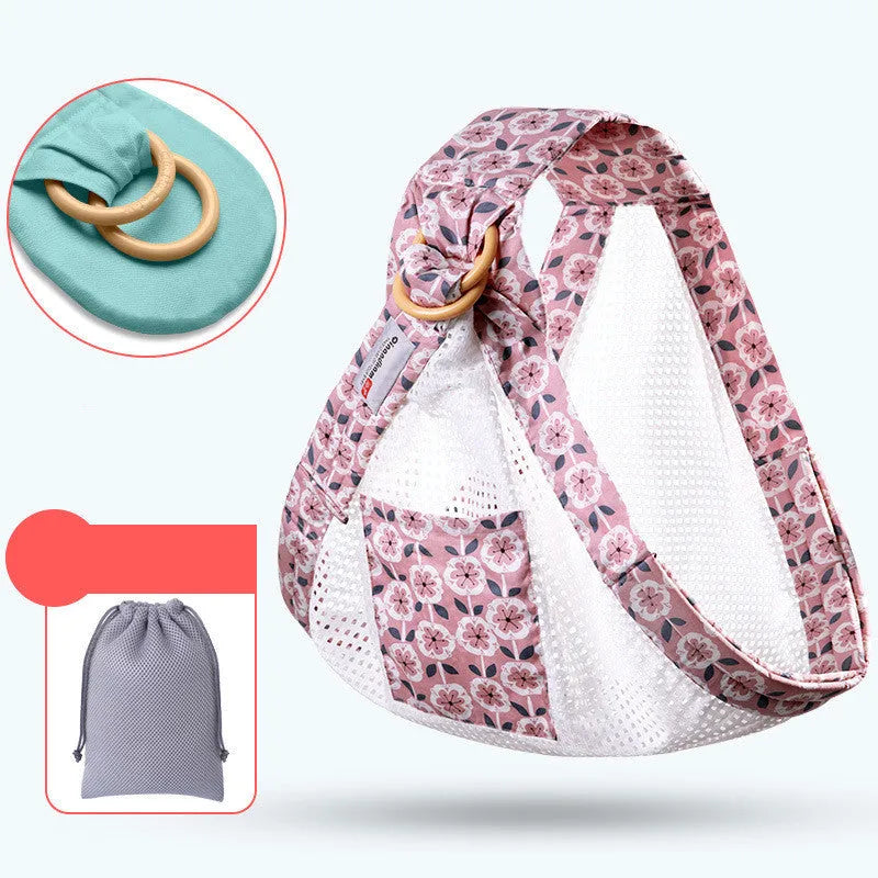 Adjustable baby wrap carrier sling shown in blue-green colour, suitable for newborns up to 36 months