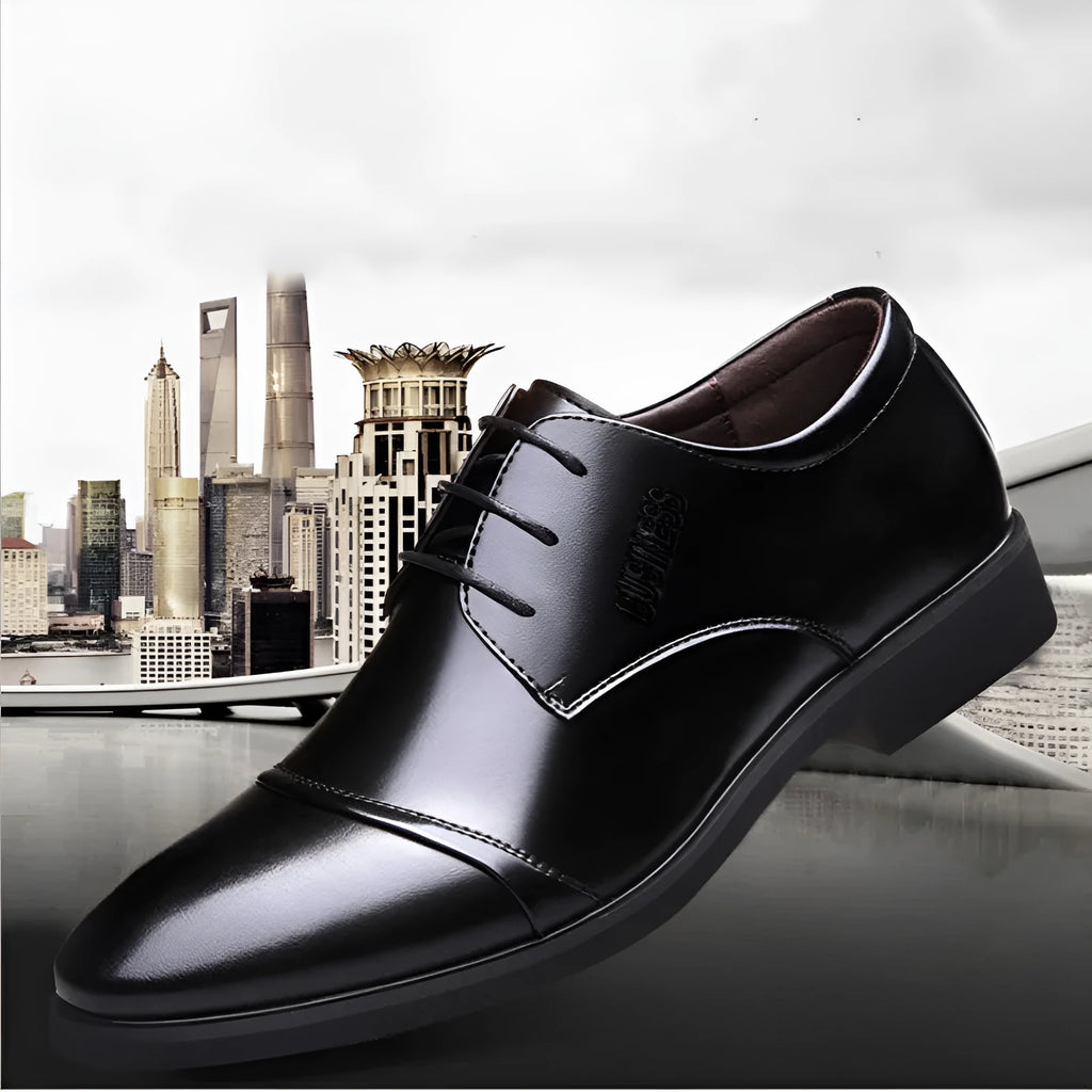 Men's black formal lace-up shoes with rubber sole and horse buckle detail