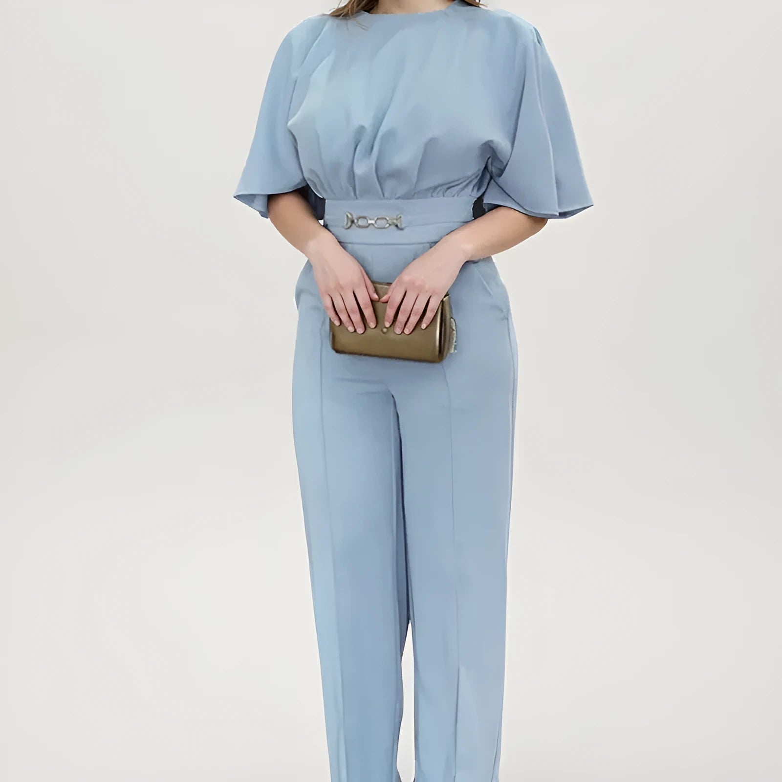 Blue polyester men's suit set with long sleeve jacket and trousers on a hanger.