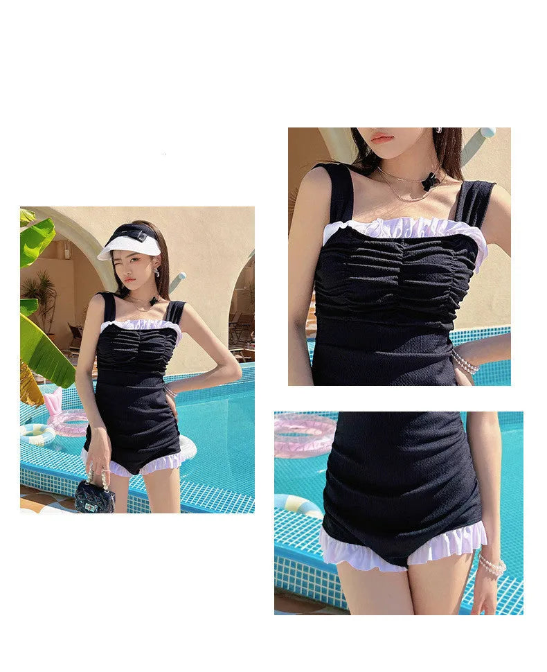 Women's solid colour one-piece jumpsuit swimsuit with suspender straps in pink, green, or black.