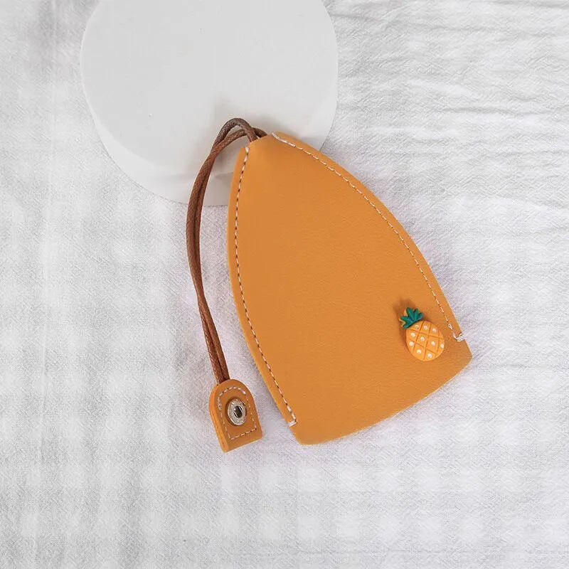 Colourful cartoon PU leather pull-out key case for car keys, shown open and closed