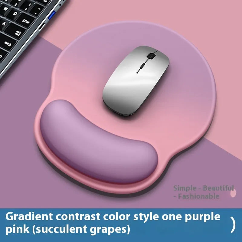 Silicone mouse mat with wrist support in a gradient blue and black colour pattern.