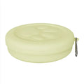 Collapsible silicone dog bowl and snack box set in green, shown in open and closed states.