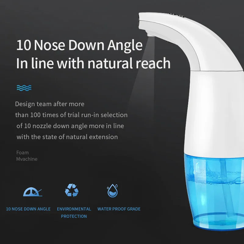 White intelligent induction foam machine on countertop with hand under nozzle dispensing foam