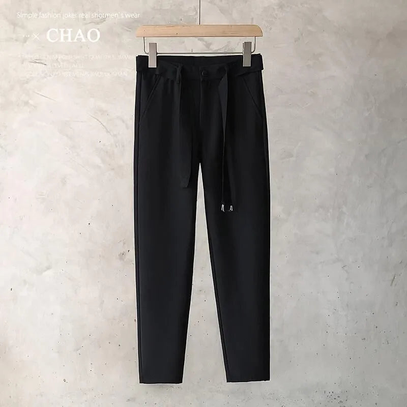 Boys slim straight wool blend trousers in neutral colours with tapered leg design
