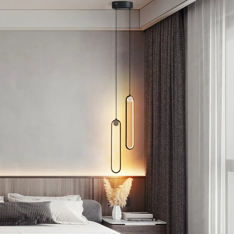Nordic minimalist oval bedside chandelier in gold finish with integrated LED light source
