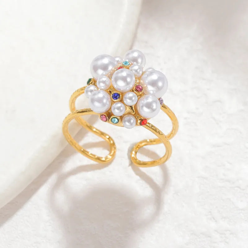 Women's adjustable open-mouth ring in stainless steel with pearl decorative elements