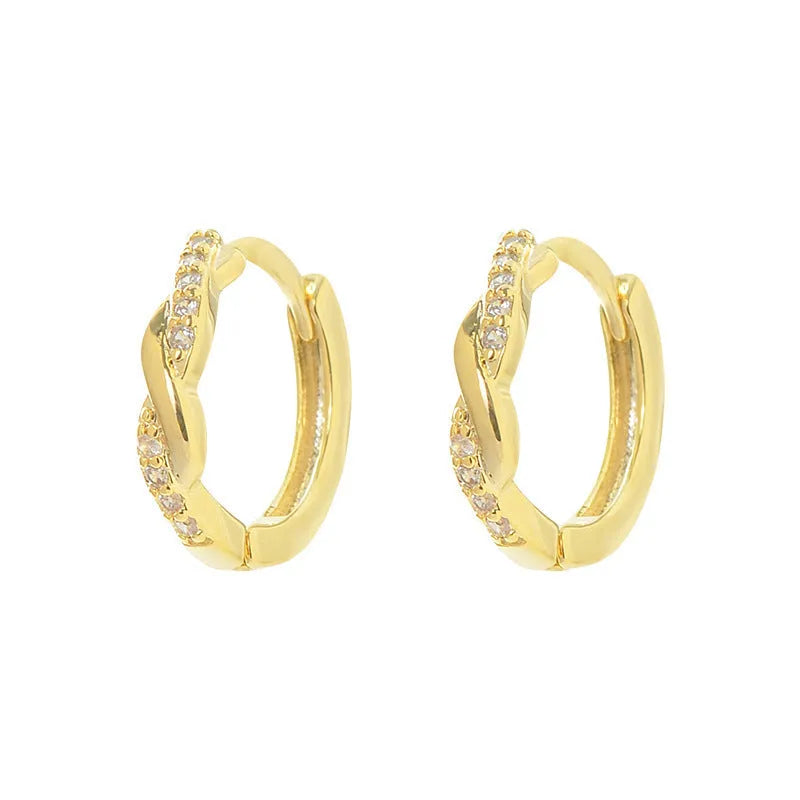Geometric interwoven hemp rope earclip earrings in a gold or silver copper finish.