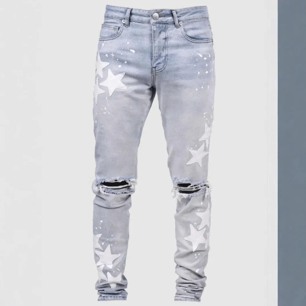 Men's slim stretch jeans in blue, grey, and light blue colours with embroidery detail