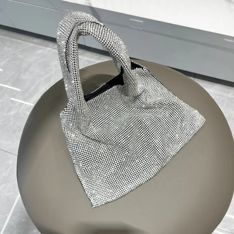Silver handbag with rhinestone decoration made from cotton thread, open pocket design