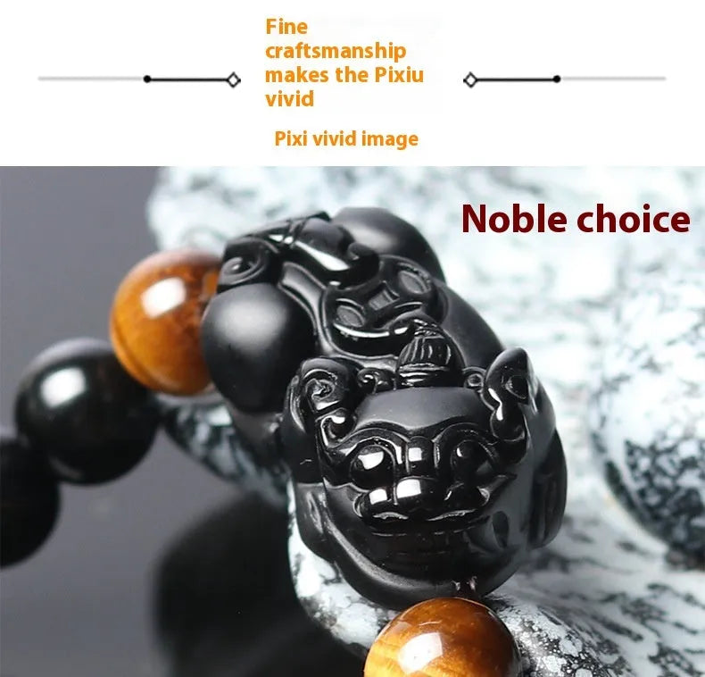 Black Mexico Gold Sheen Obsidian pi xiu bracelet with ethnic styling on wrist