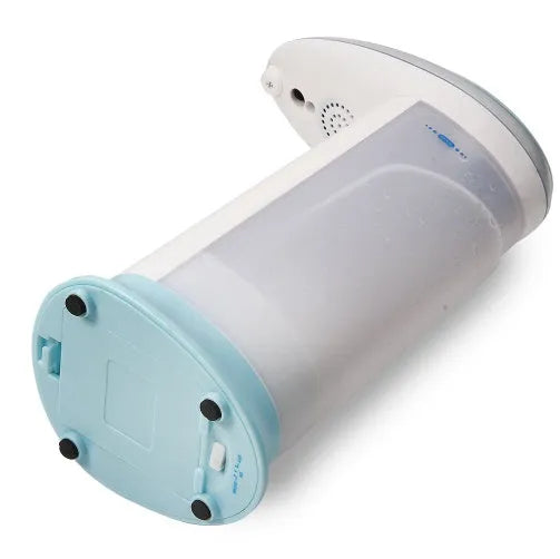 Automatic sensor soap dispenser on a desktop, white ABS plastic body with infrared sensor.