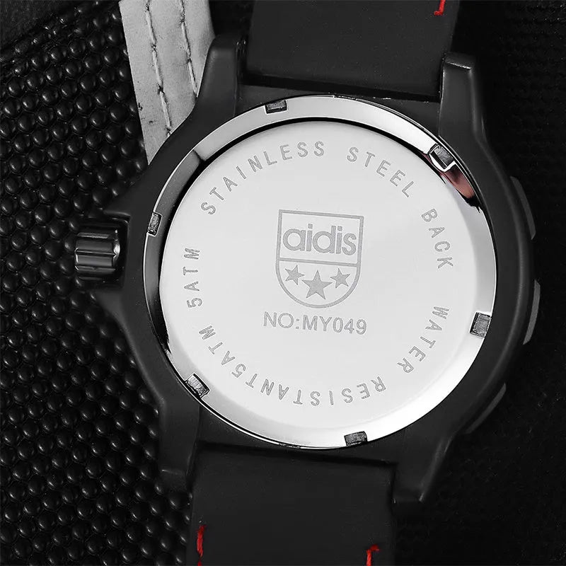 Men military watch with black dial, silicone band, and luminous hands on white background