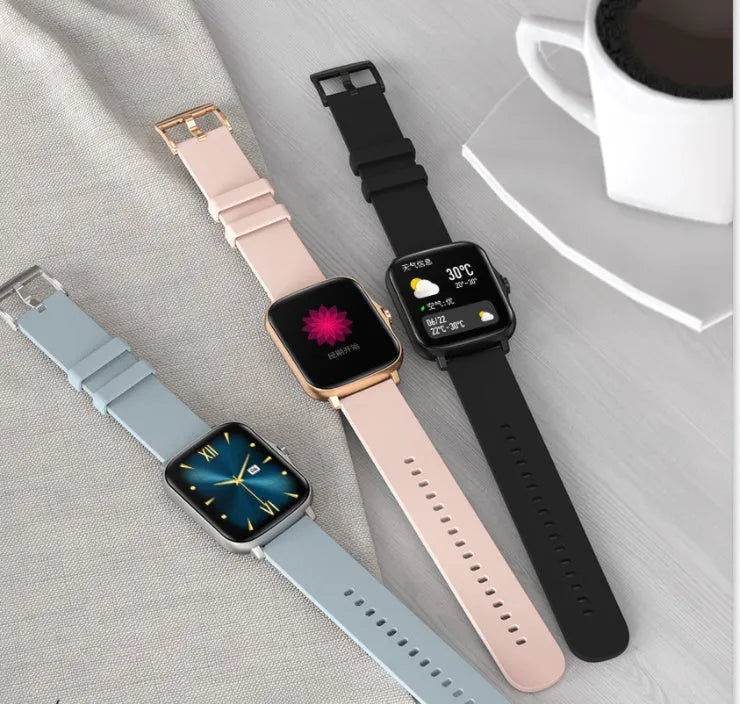 Black smart watch with 1.7-inch colour touch screen and adjustable strap on a wrist.