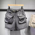 Men's loose-fitting casual shorts with multiple pockets in black or grey colours