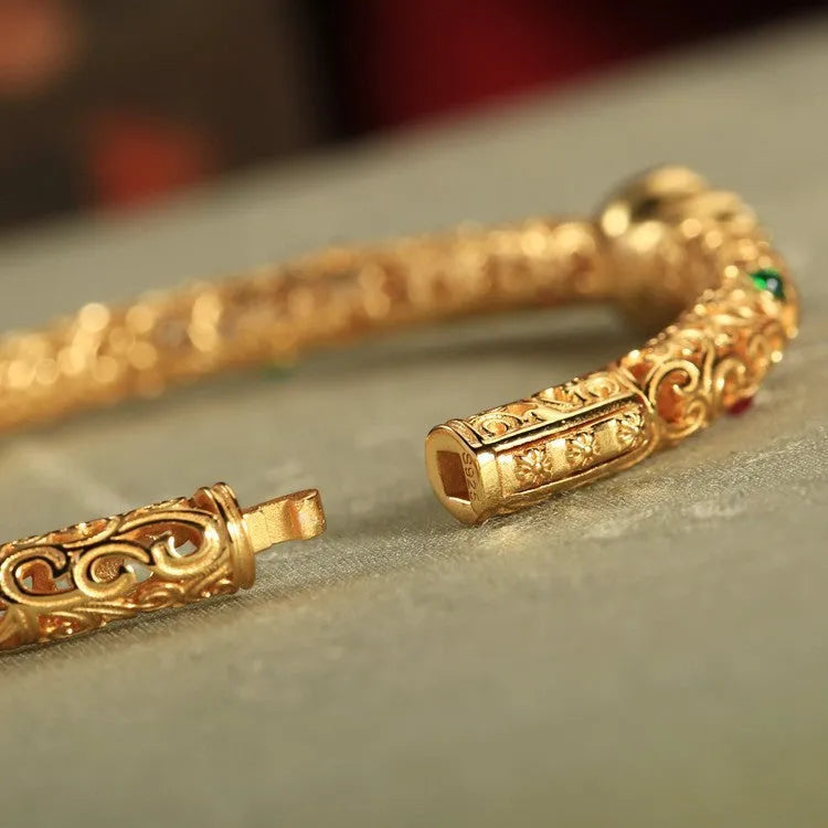 Gold-plated open back women's bracelet with traditional Chinese gourd charm on copper construction