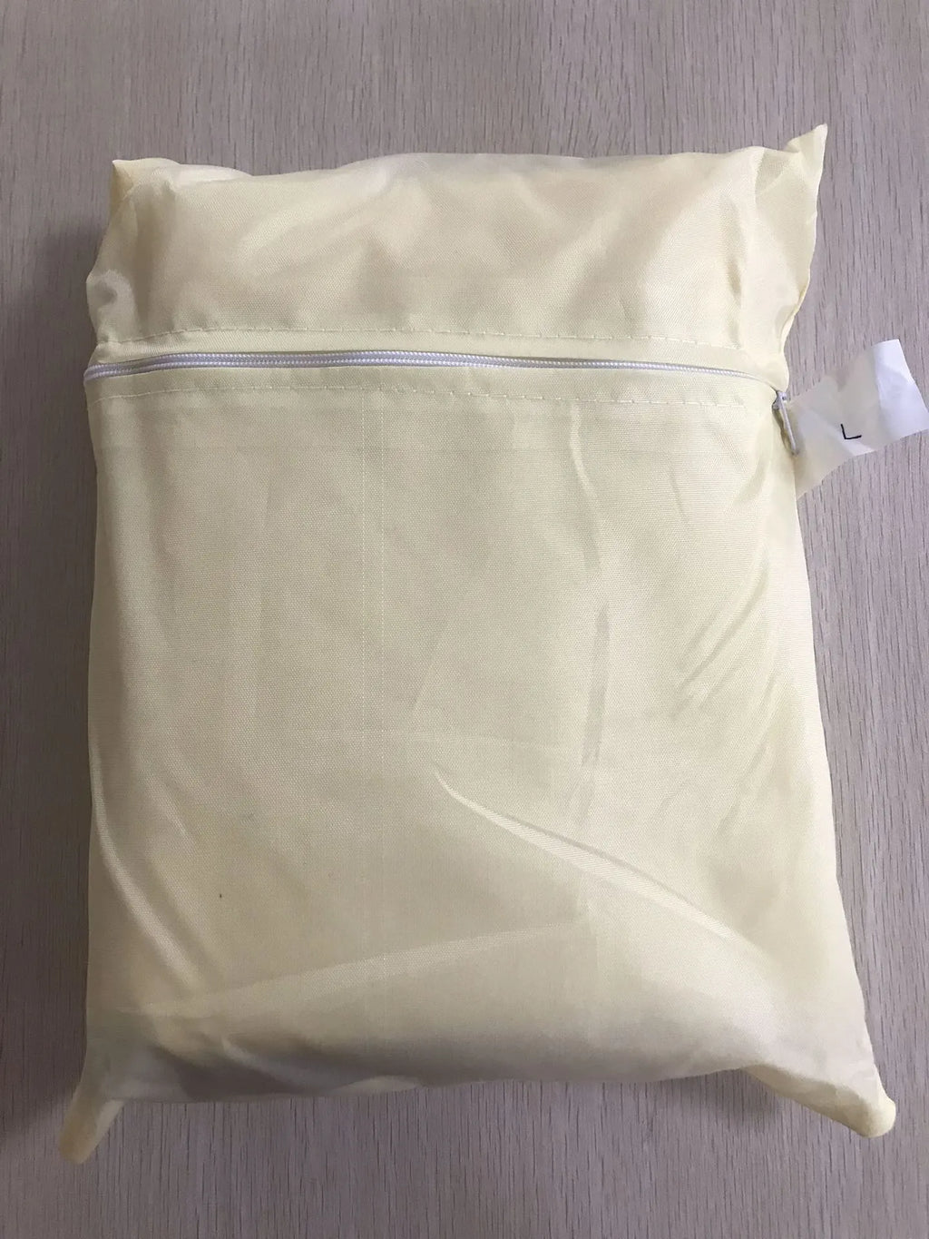 Beige polyester outdoor oven cover for barbecue protection in Nordic style