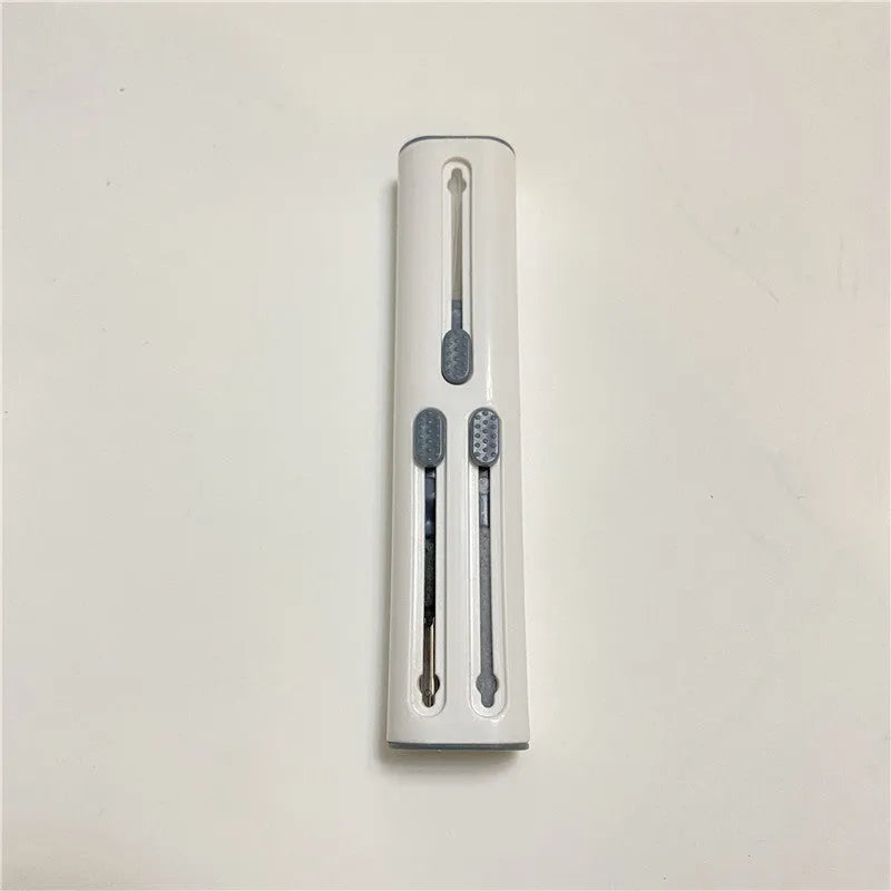 AirPods Pro cleaning kit with multiple heads including flocking sponge and metal nib on white background