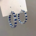 Large copper hoop earrings for women with geometric quadrilateral shape and inlaid zircon in white gold colour finish
