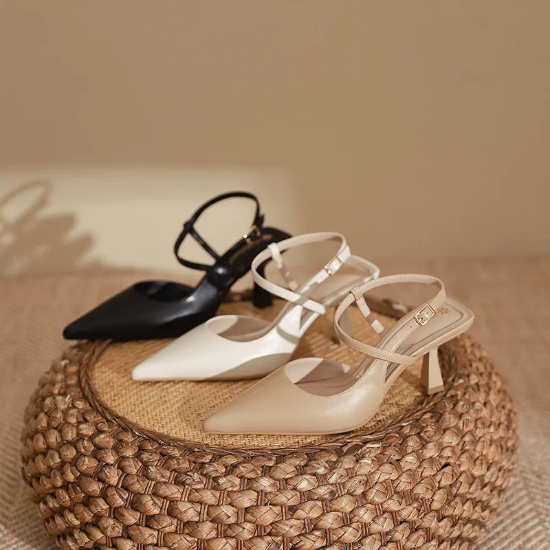 Solid colour women's pointed stiletto heel pumps with imitation sheepskin lining available in apricot brown and black