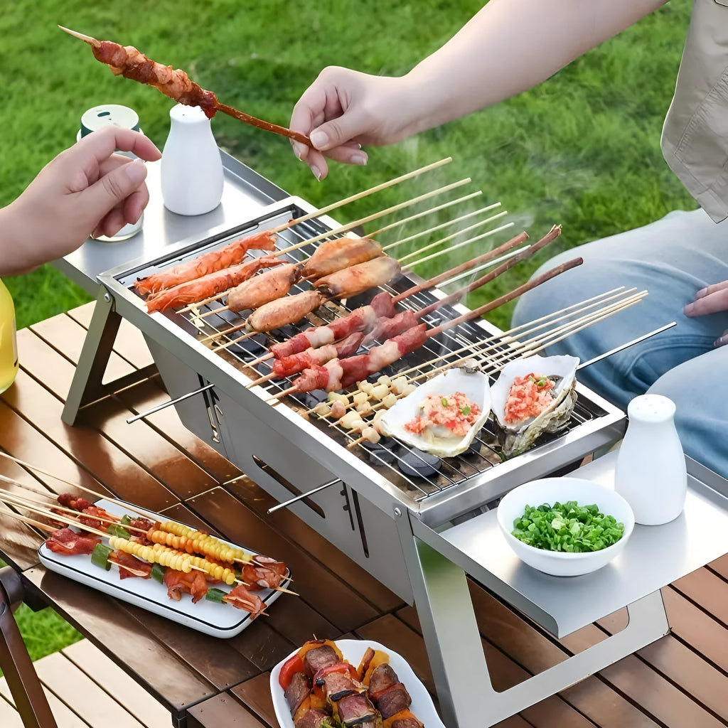 Small folding portable charcoal grill for outdoor barbecues