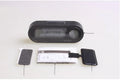 Black electronic car clock and thermometer with LED digital display on an adjustable dashboard bracket.