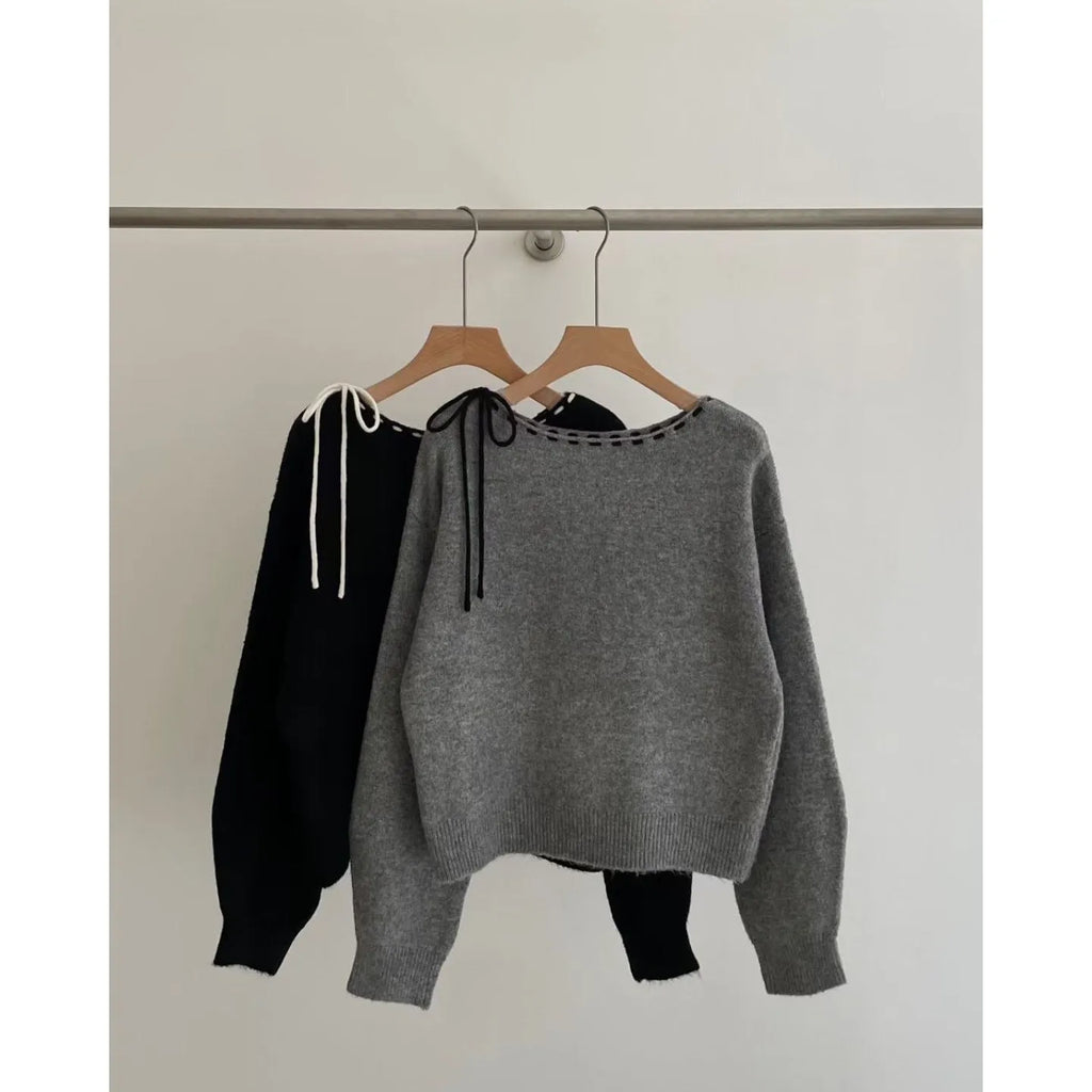 Grey loose-fitting women's pullover jumper made from regenerated cellulose fibre.