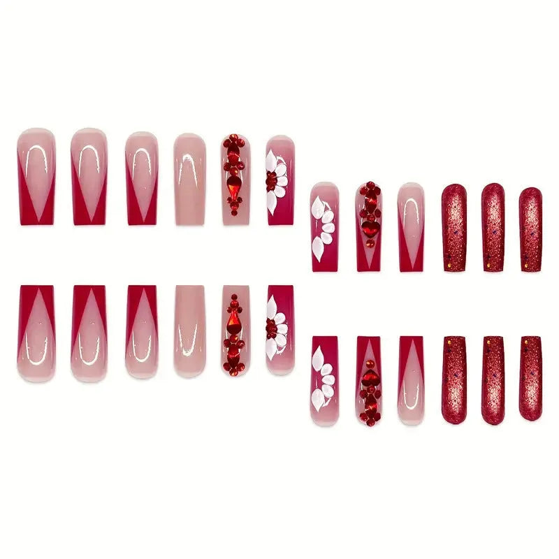 Artificial nails with floral pattern and red diamond accents in European square shape