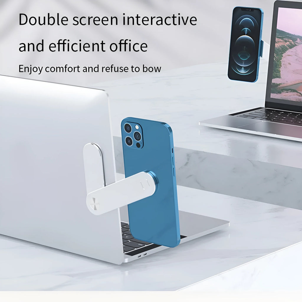 Black aluminium laptop phone holder with magnetic mount attached to side of silver laptop