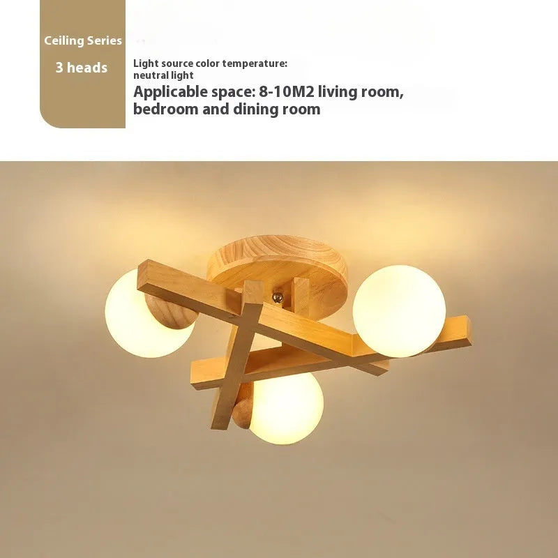 Modern wooden-style ceiling light with three adjustable light heads in a neutral finish