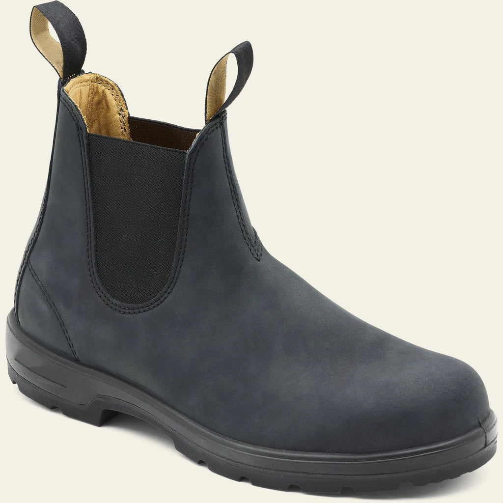 Vintage brown Chelsea boot with frosted PU upper, round toe, and mid-calf height on a wooden surface.