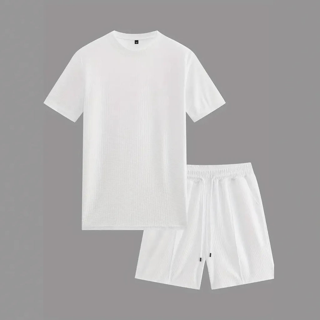Man wearing a light apricot waffle texture short sleeve blouse and matching shorts for summer.
