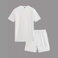 Man wearing a light apricot waffle texture short sleeve blouse and matching shorts for summer.